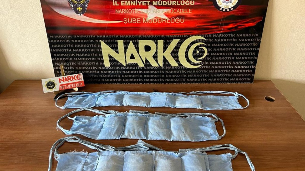 1 kiloluk uyuşturucuyu kıyafetine dikti