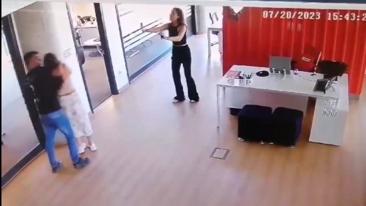 İş yerinde kadını rehin alan saldırgan kamerada