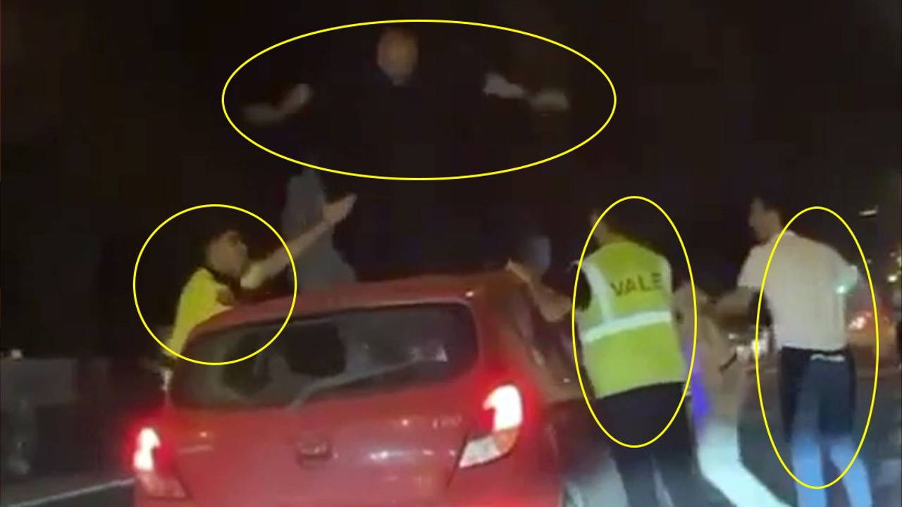 Linç etmeye kalktılar. Trafikte makas atan otomobilin üzerinde zıpladı
