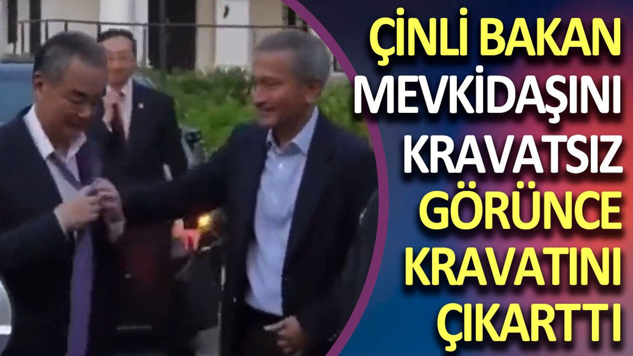 Çinli bakan mevkidaşını kravatsız görünce kravatını çıkardı