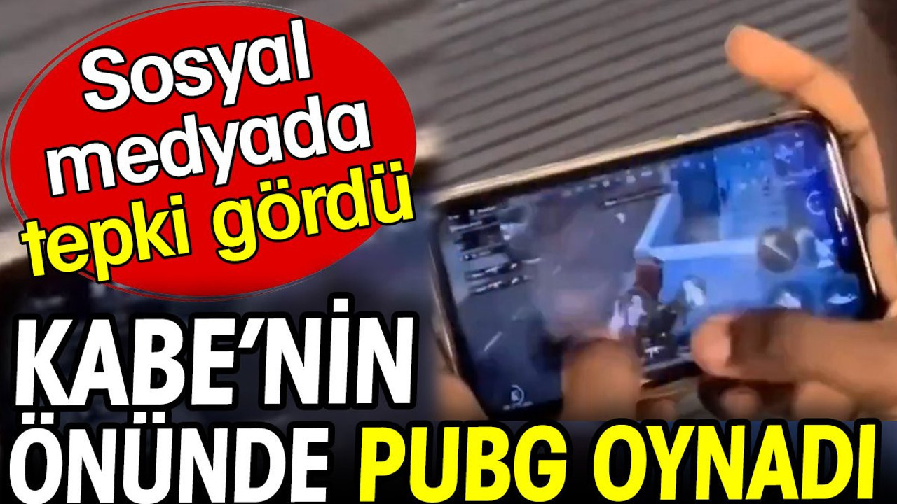 Kabe'nin önünde PUBG oynadı. Sosyal medyada tepki gördü