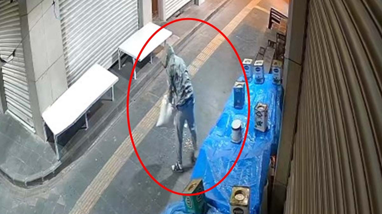 Kapüşonlu hırsız fıstık çuvalını sırtladığı gibi kaçtı