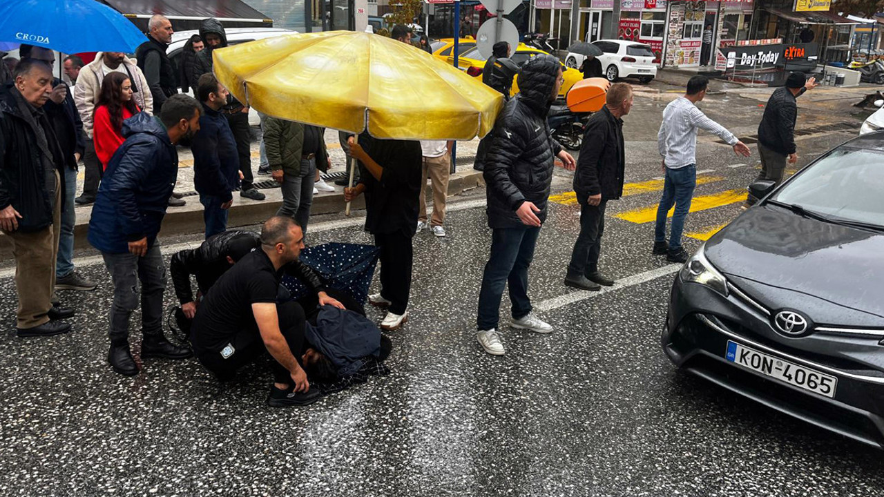 Edirne'de kaza! Yaralıya esnaftan şemsiyeli kalkan