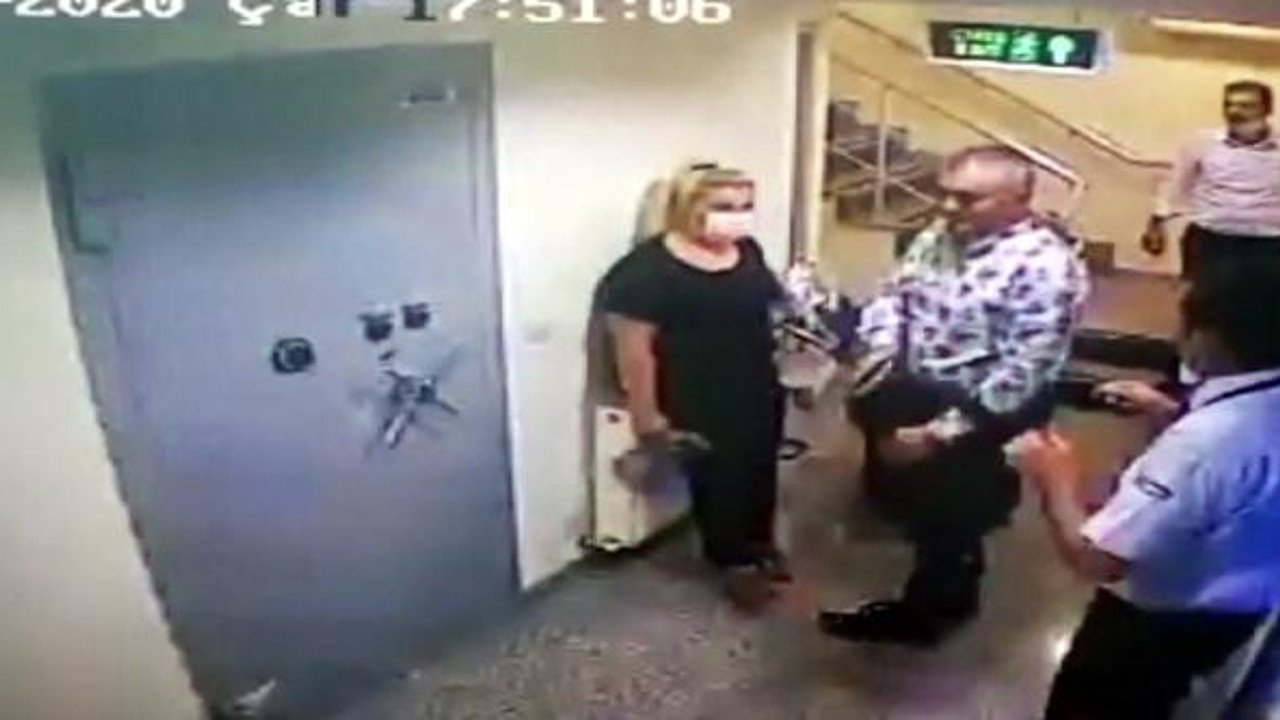 Güvenlik görevlisinin silahını kapıp çalışanının kafasına dayadı. Bu nasıl banka müdürü