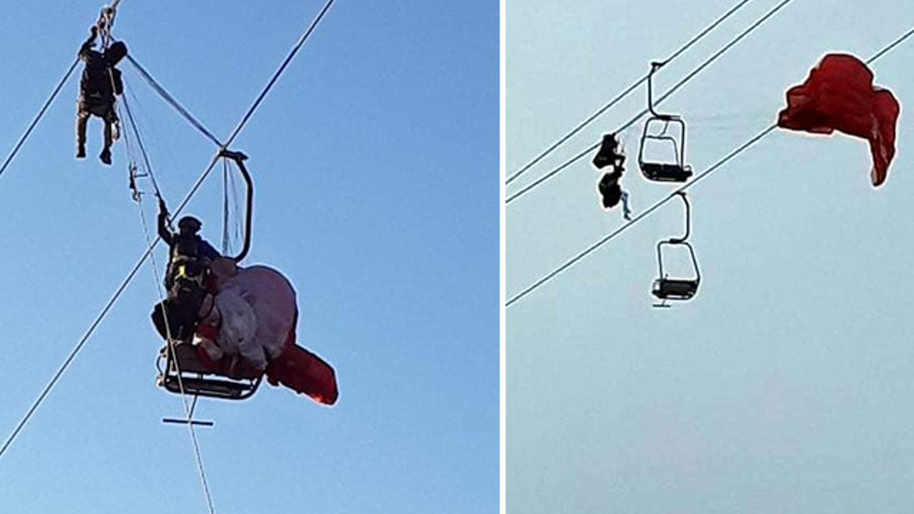Paraşütçüler teleferik telesiyej hattında asılı kaldı
