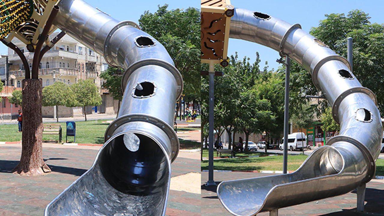 Çocuk parkına sacdan kaydırak yaptılar. Çocukların kolları ve bacakları yandı