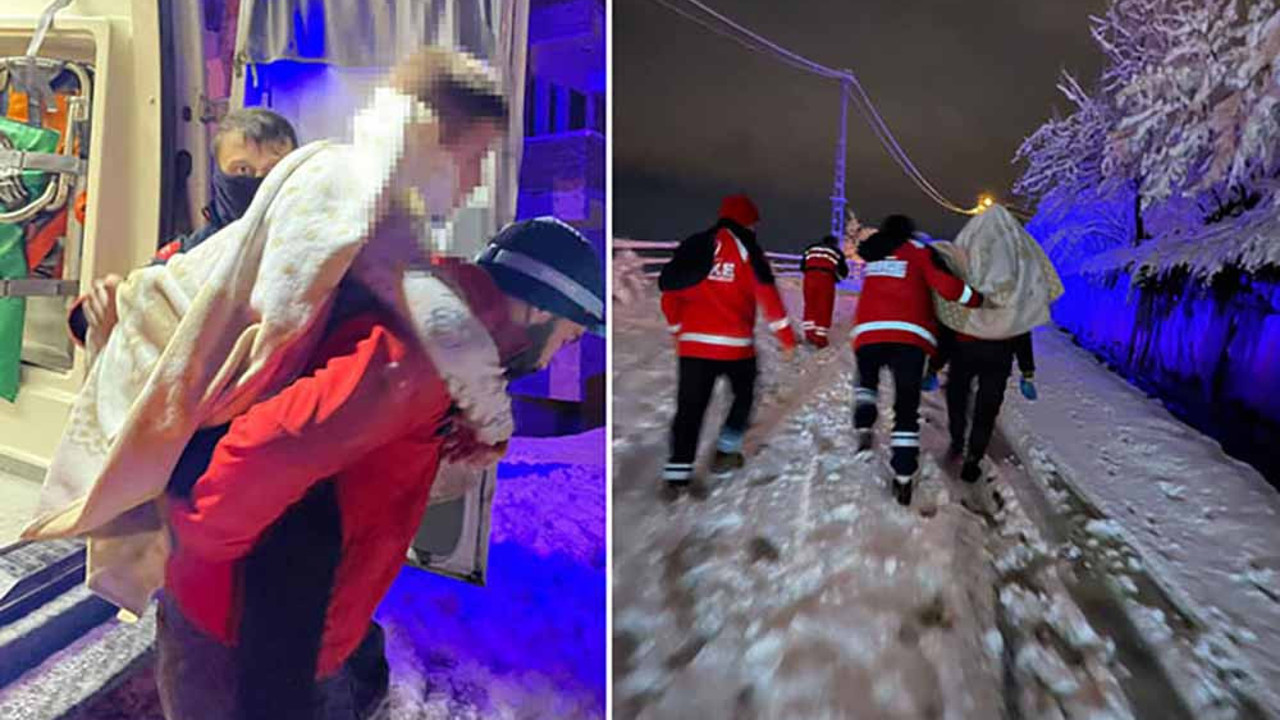 Hasta çocuğu karlı yolda sırtında taşıyan hemşireye ödül