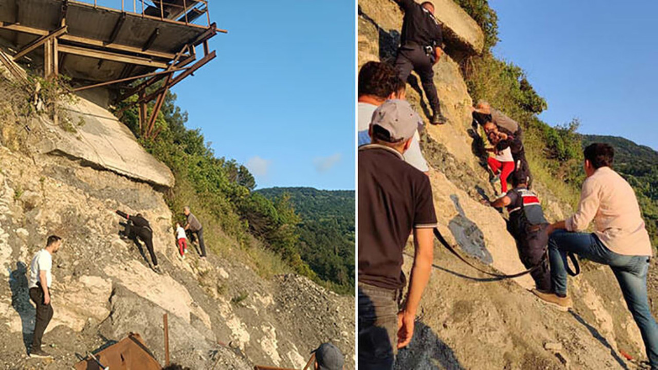 Kayalıklarda mahsur kalan dayı-yeğen halatla kurtarıldı
