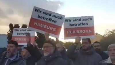 Menzil’deki miras kavgasında yeni perde: Almanya’da pankart açıp eylem yaptılar