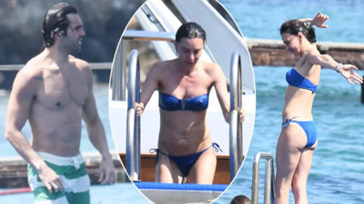 Ünlü oyuncu Hande Ataizi sportif açma germe hareketleri yaparak deniz sezonunu açtı