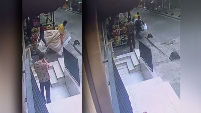 Çaldıklarını taşımakta zorlanan hırsıza esnaf yardım etti