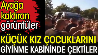 Küçük Kız çocuklarını giyinme kabininde çektiler. Ayağa kaldıran görüntüler