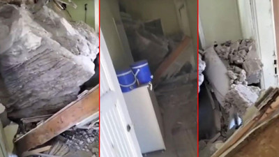 Depremde dağdan kopan kaya parçası eve girdi.Büyük hasar oluştu