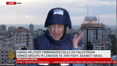 Al Jazeera muhabiri canlı yayında füze saldırısına yakalandı