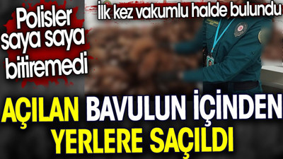 Açılan bavulun içinden yerlere saçıldı. İlk kez vakumlu halde bulundu