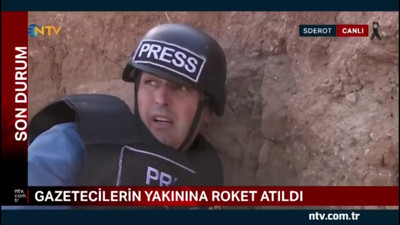 NTV muhabirinin Gazze sınırındaki zor anları. Gazetecilerin bulunduğu bölgeye roket düştü