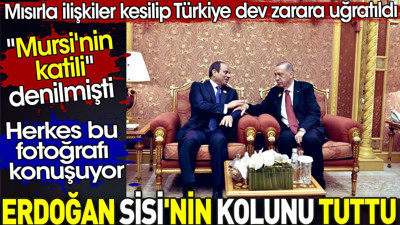 Erdoğan Sisi'nin kolunu tuttu. 'Mursi'nin katili' denilmişti