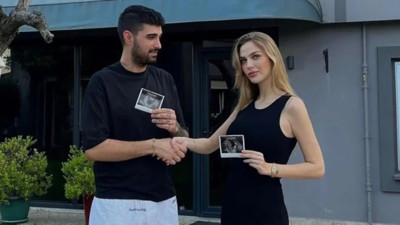 İkiz bebeklerine hamile olan Yasemin Şefkatli karnı burnunda çekim yaptı