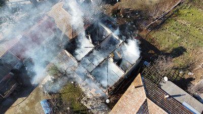 Ocağı açık unutup şehir merkezine gitti. Evinin yanışını ağlayarak izledi