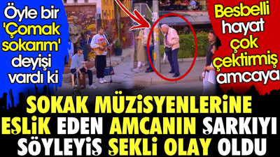 Sokak müzisyenlerine eşlik eden amcanın şarkıyı söyleyişi olay oldu. Öyle bir 'çomak sokarım' deyişi vardı ki.. Besbelli hayat çok çektirmiş amcaya