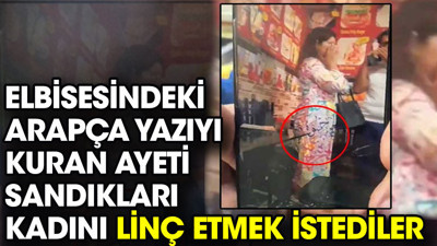 Elbisesindeki Arapça yazıyı Kuran ayeti sandıkları kadını linç etmek istediler