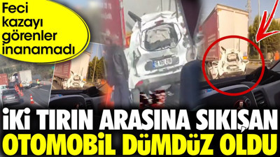İki tırın arasına sıkışan otomobil dümdüz oldu. Feci kazayı görenler inanamadı