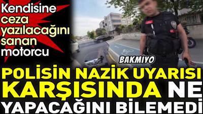 Kendisine ceza yazılacağına sanan motorcu polisin nazik uyarısı karşısında ne yapacağını bilemedi