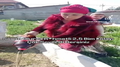 Kolayla mezar sulayan kadın tepki çekti