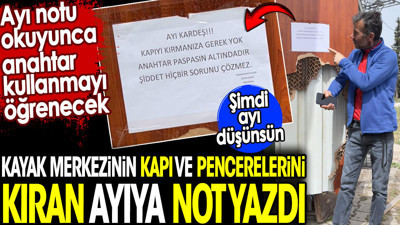 Kayak merkezinin kapı ve pencerelerini kıran ayıya not yazdı. Ayı notu okuyunca anahtar kullanmayı öğrenecek. Şimdi ayı düşünsün