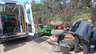 Traktörün altında kalan sürücü ölümden döndü