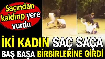 İki kadın sokak ortasında saç saça baş başa birbirine girdi! Saçından kaldırıp yere vurdu