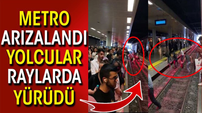 Metro arızalandı yolcular raylarda yürüdü