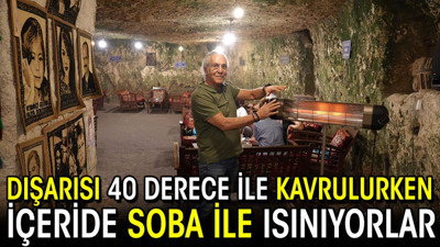 Dışarısı 40 derece ile kavrulurken içeride soba ile ısınıyorlar