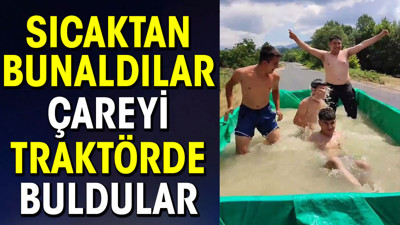 Sıcaktan bunaldılar çareyi traktörde buldular