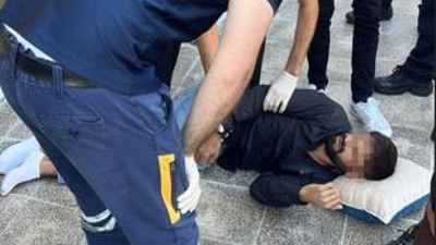 Polisi görünce 2. kattan atladı