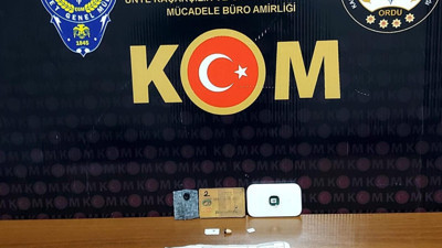 Ehliyet sınavında düzenekle yakalandı