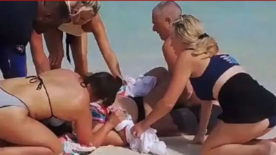 Karısını kurtarmak için dev köpekbalığıyla boğuştu. Dünya fedakar kocayı konuşuyor