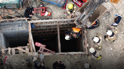 İş makinesinin tek darbesi yetti! İstanbul'da moloz toplayan işçinin asansör boşluğunda yaşam savaşı