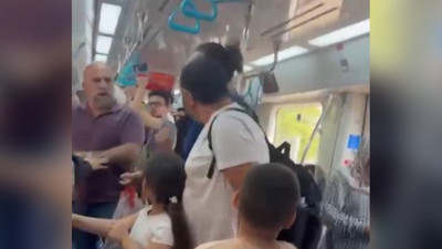 Marmaray’da çocuklarının yanında babaya yumruk