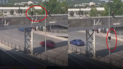 Yürekleri ağza getirdi Üst geçitten elektrik direğine atladı