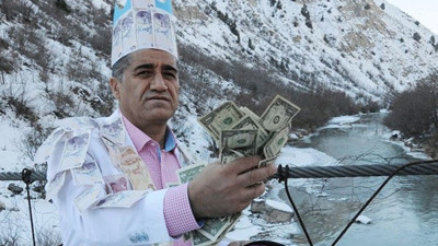 Bir çanta doları Zap Suyu'na attı