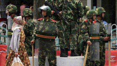 Türkkan'dan AKP'ye "Doğu Türkistan" tepkisi