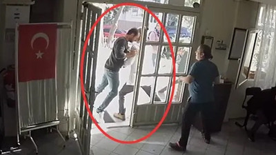 Sağlık raporu vermeyen doktora kafa attı