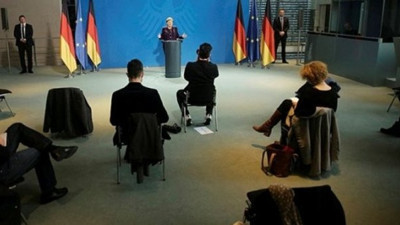 Merkel'den dikkat çeken korona önlemi