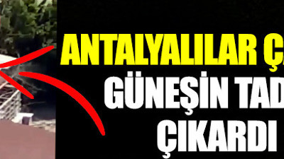 Antalyalı vatandaşlar çatıda güneşlendi