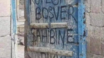 2 cilt kitap yazsan bu kapıdaki cümleyi anlatamazsın, işte her şeyi anlatan fotoğraf