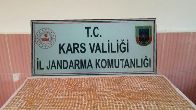 Kars'ta sahte altın sikke operasyonu. Jandarma saya saya bitiremedi