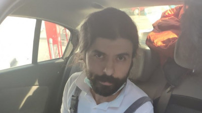 Yüzbaşı iskelede boya yaparken yakalandı. Üzerinden sahte kimlik çıktı