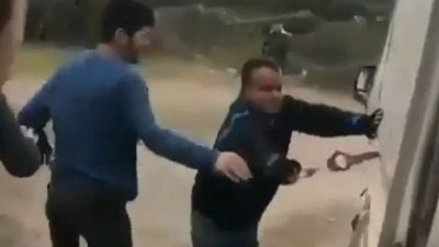 Kamyonete kelepçeleyip zorla yürüttüler. Engelli gence yapılanlar büyük tepki çekti