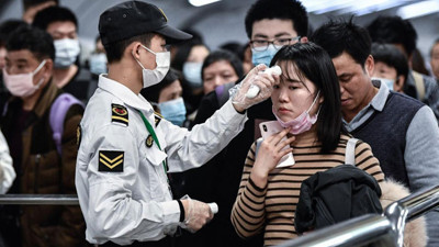 DSÖ'den koronayla ilgili tüm bilinenleri değiştirecek açıklama. Vuhan'daki pazarda incelemelerde bulunuyorlardı